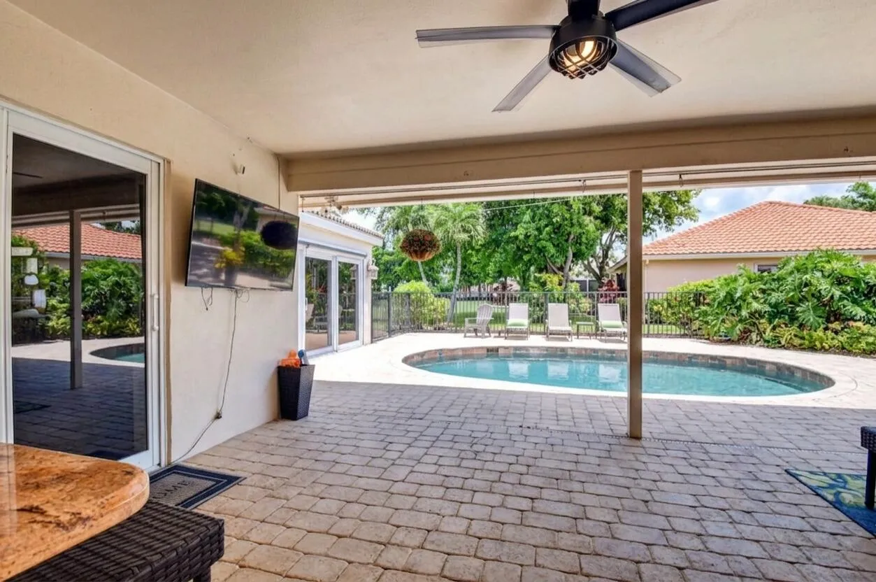 Covered Patio Overlooking the Free-Form Pool
