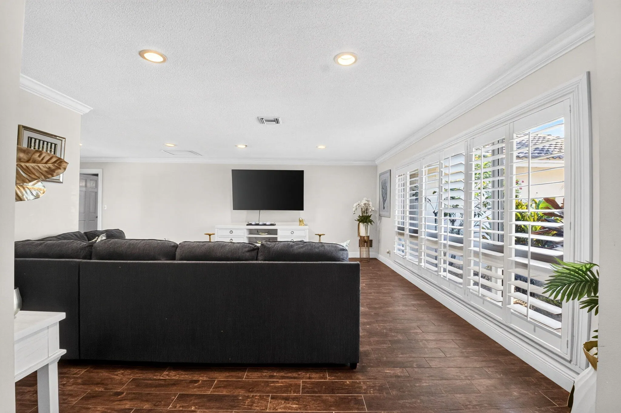 Great Room | Full Wall of Plantation Shutters