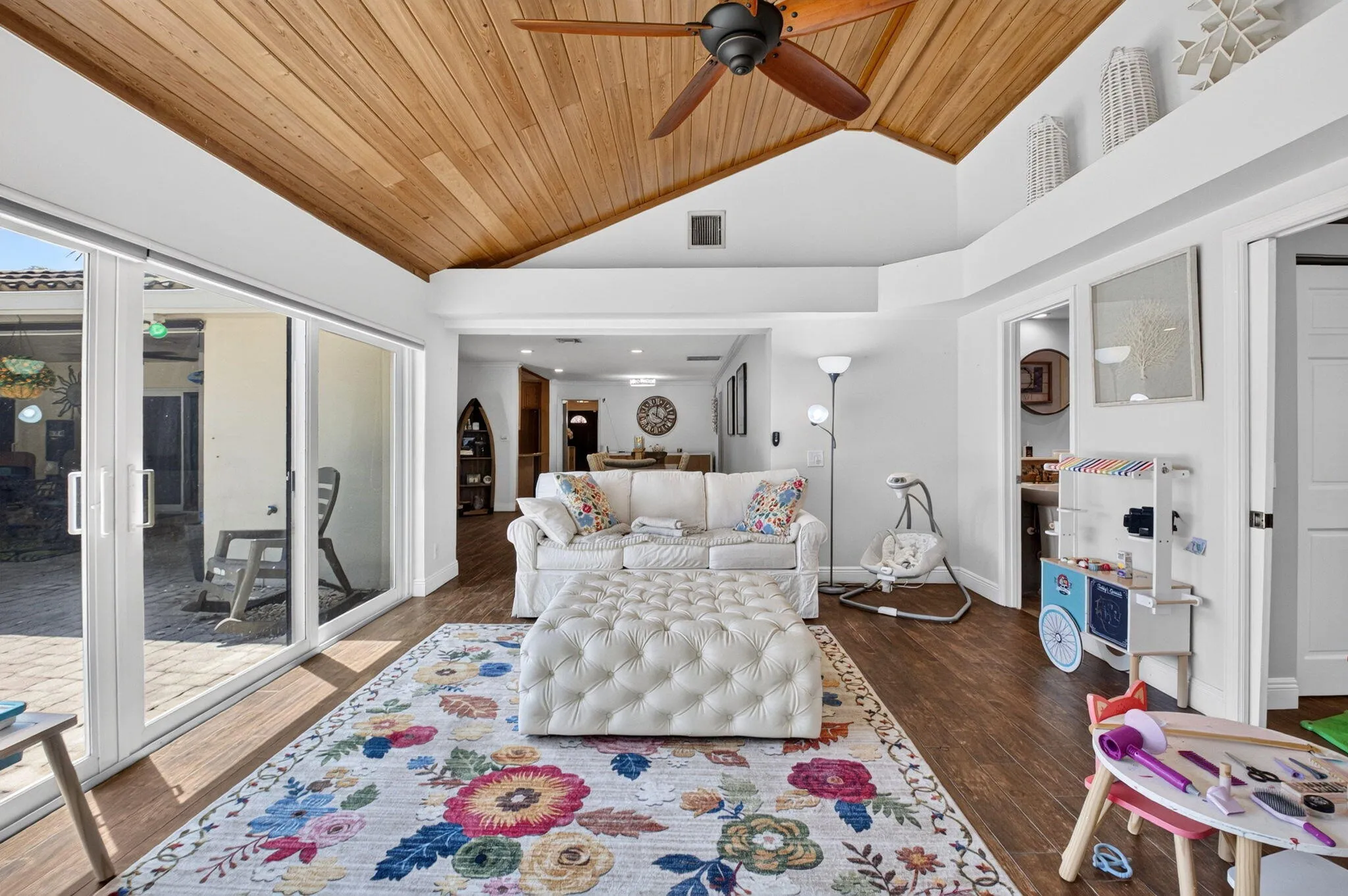 Florida Room Opens to Living & Dining Rooms
