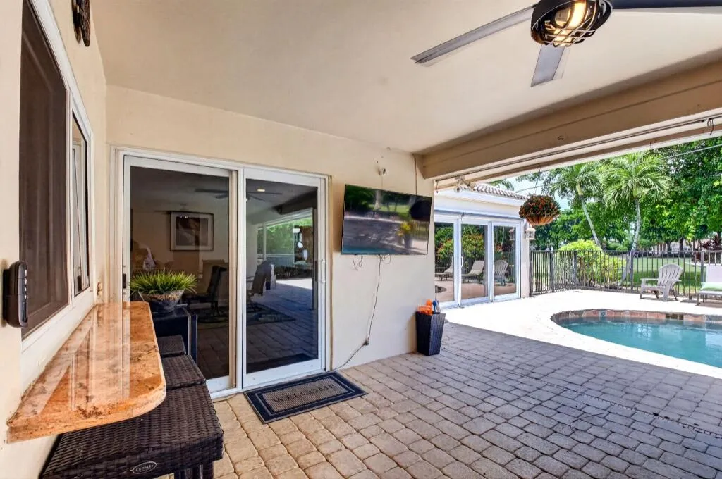 Covered Patio | Outdoor TV & Granite Bar Counter