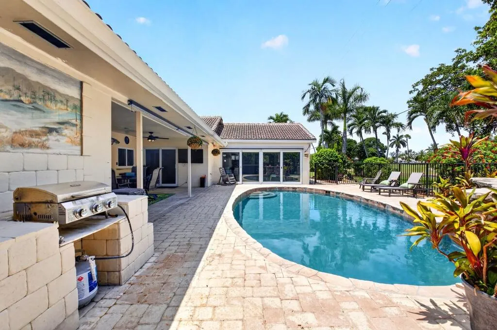 Built-In Gas Grill, Pool & Golf Course Backdrop