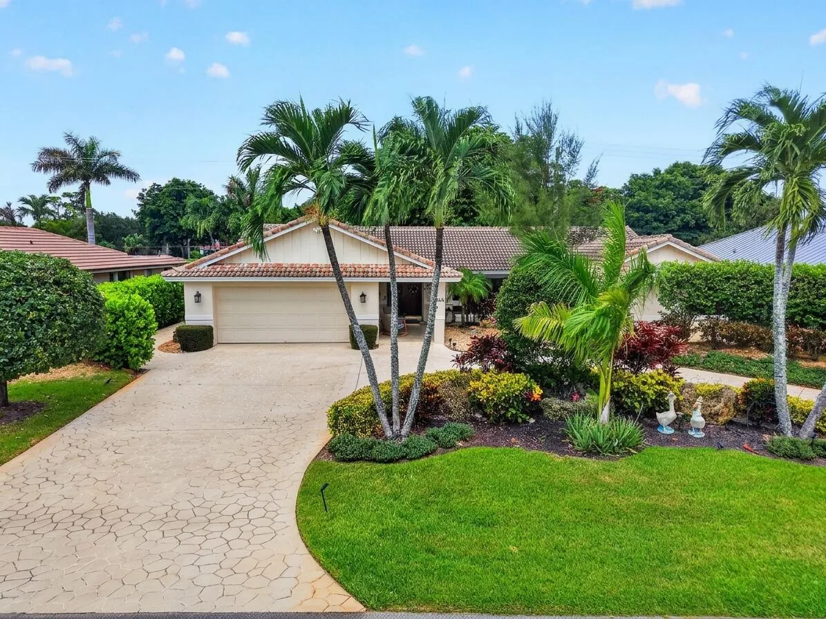 Curb Appeal | Royal Palms & Manicured Tropical Beds
