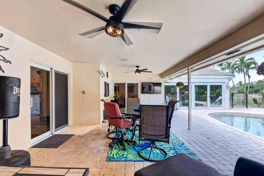 Covered Patio Living Room Under a Paddle Fan