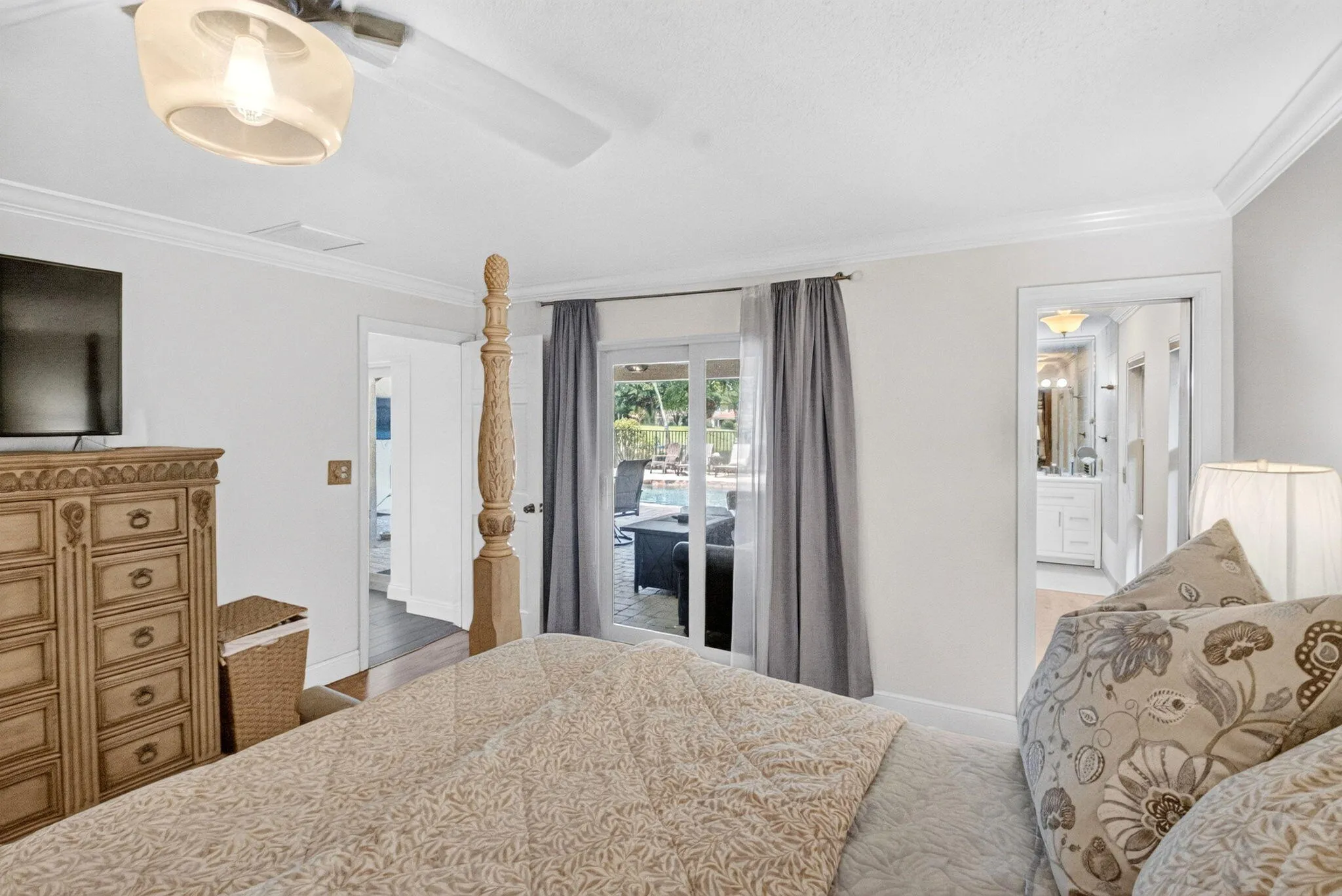 Primary Bedroom Opens to Covered Patio & Pool