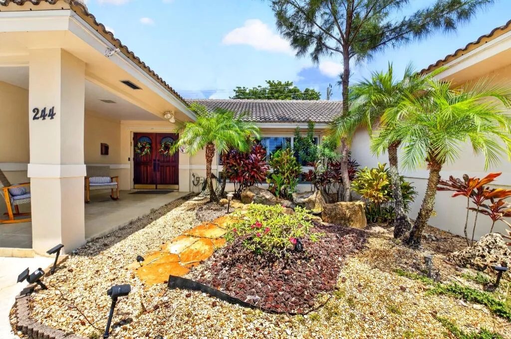 Front Entry Courtyard & Lit Tropical Rock Garden