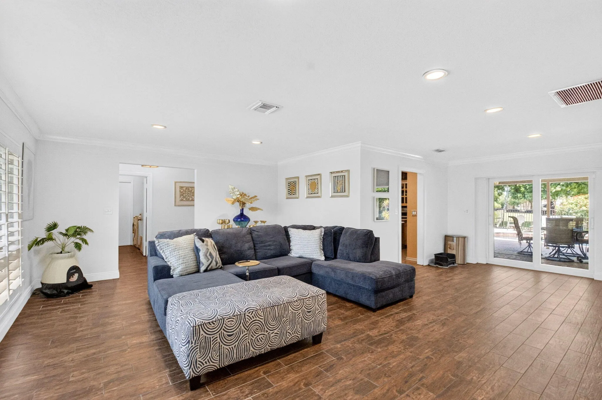 Living Room Opens to Covered Patio & Pool