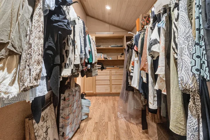 Built-Out Walk-In Closet with Drawers & Shelving