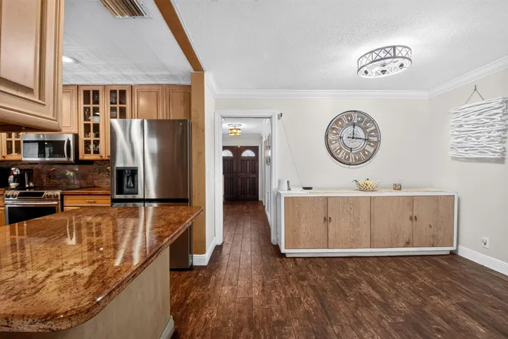 Dining Area | Sight Line Down Hall to Front Doors