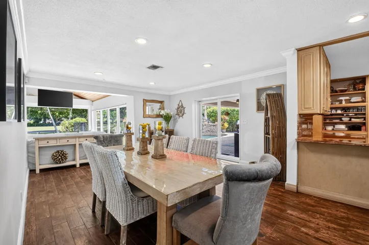 Dining Room Opens to Pool Patio & Florida Room