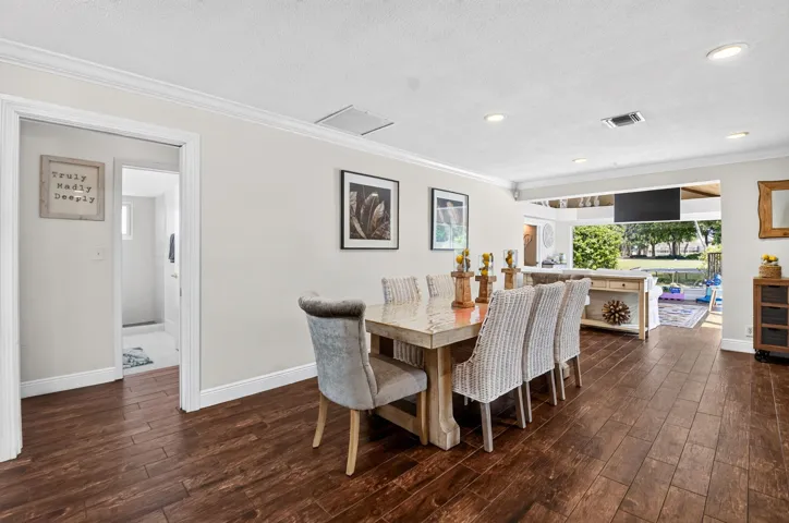 Formal Dining Open to Florida Room & Golf Views