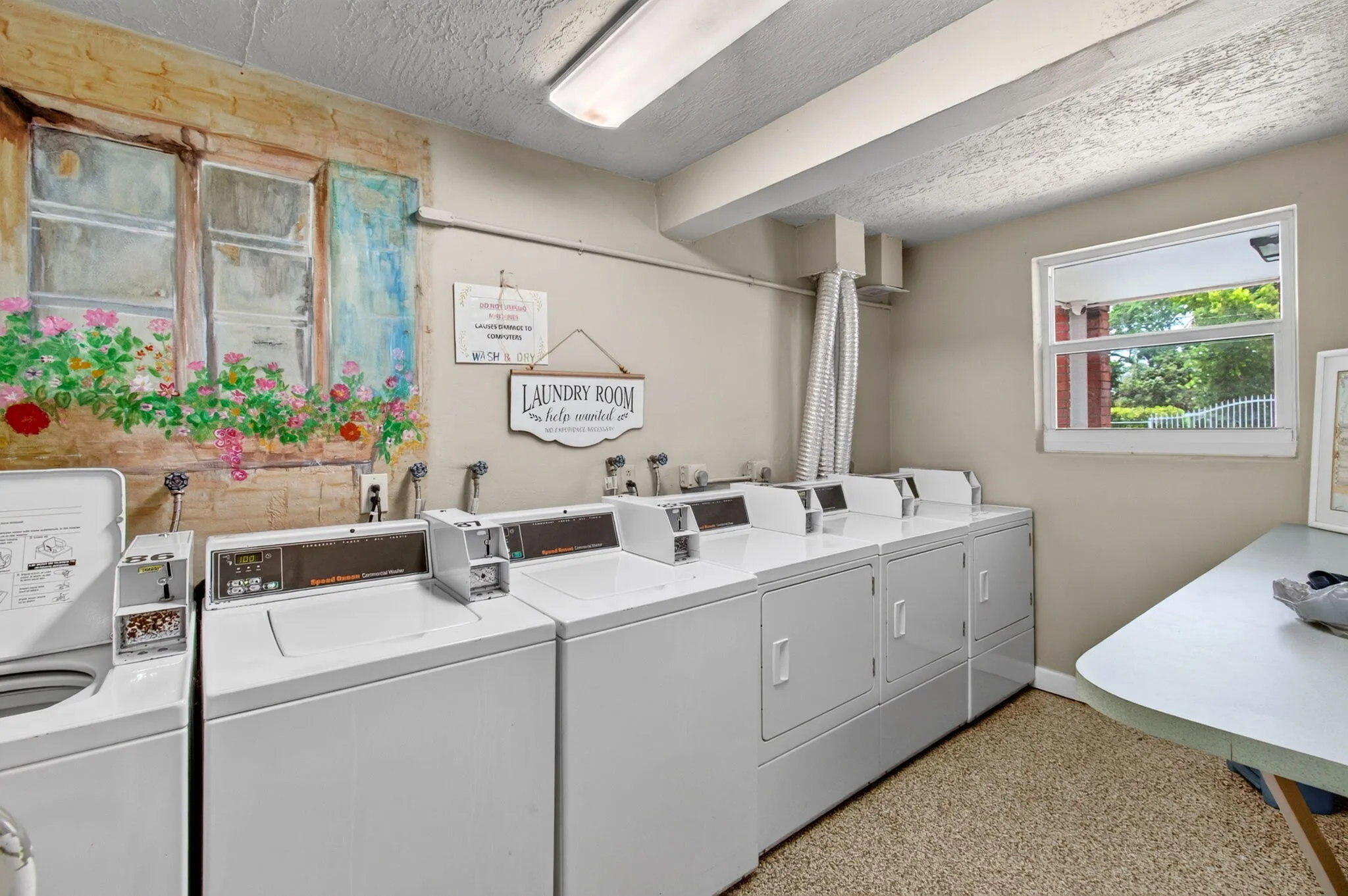Laundry around corner of unit.