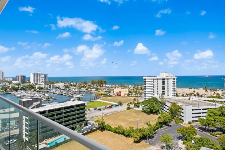 Expansive water and city vistas from a glass-paneled balcony