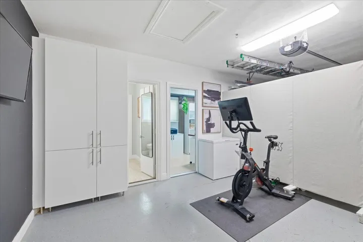 garage with pantry and peloton
