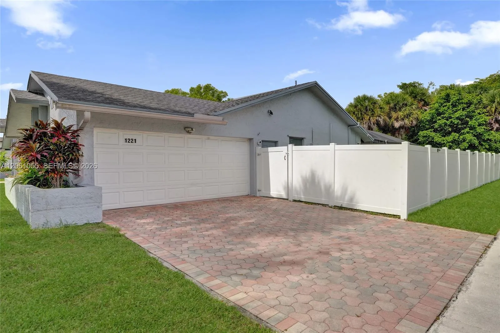 Side driveway with 2 car garage