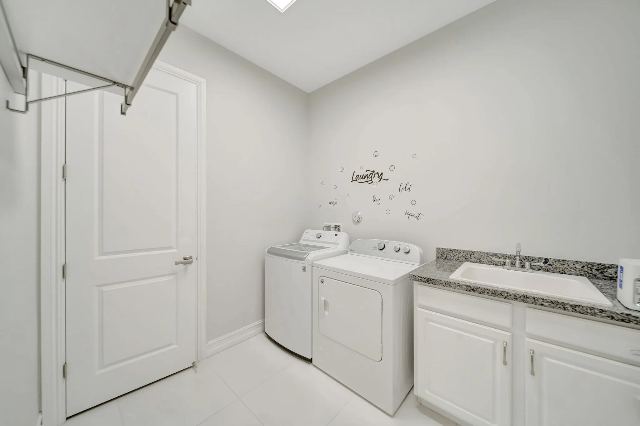 Even the Laundry Room has BUILT in closets for more storage!