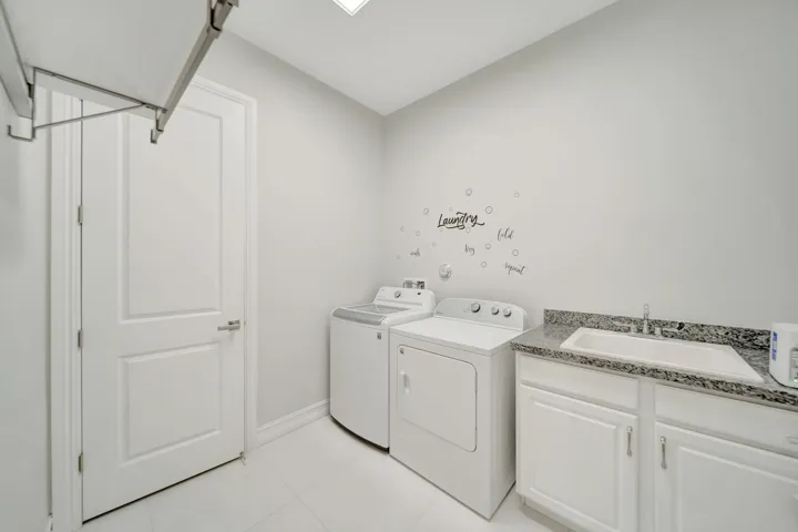 Even the Laundry Room has BUILT in closets for more storage!