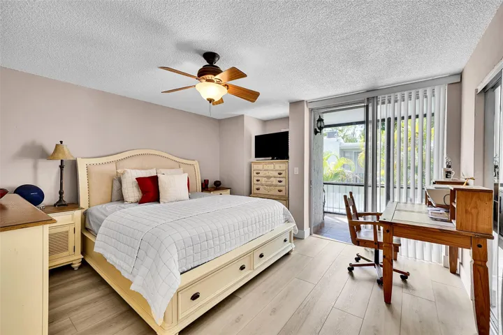 Spacious primary with private screened balcony