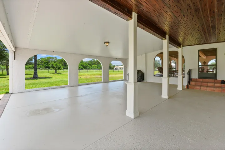 large covered rear parking or recreation area