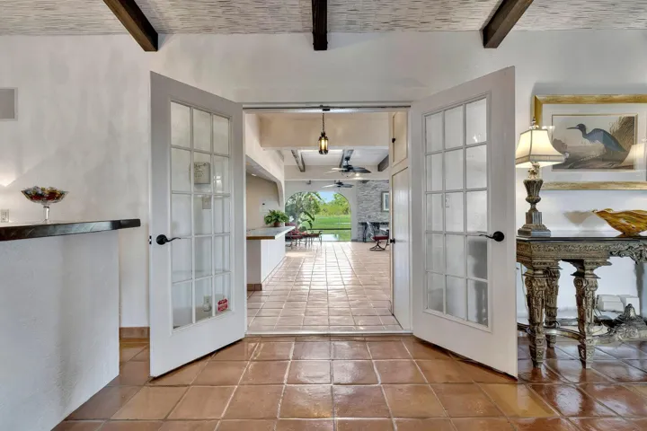 living room leading into exterior patio indoor/outdoor space