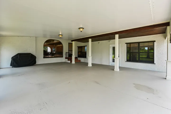 large covered rear parking or recreation area