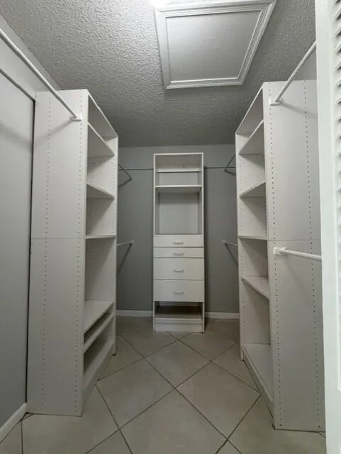 PRIMARY BEDROOM WALK IN CLOSET