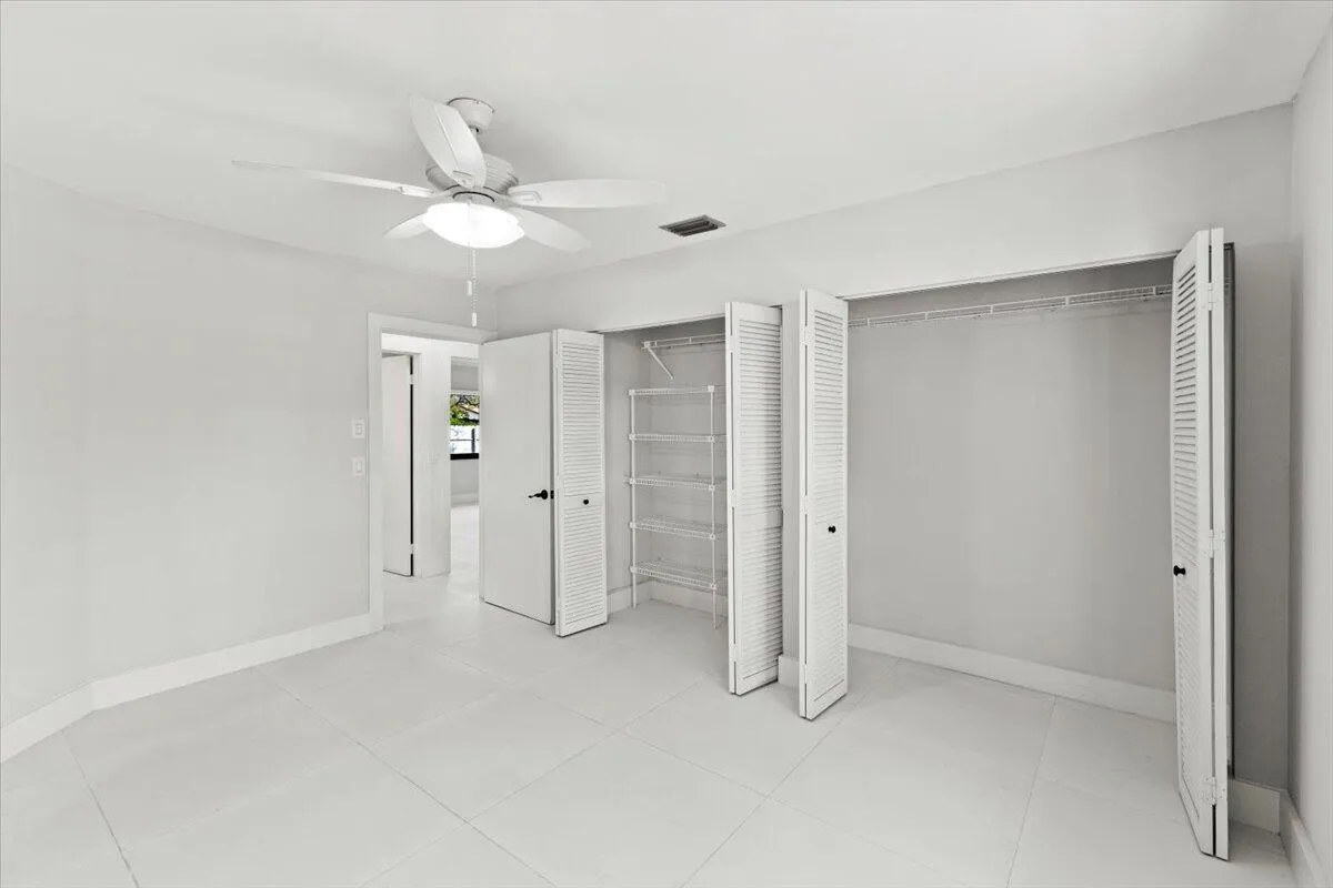 The second bedroom features dual closets.
