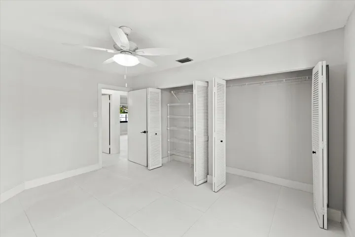 The second bedroom features dual closets.