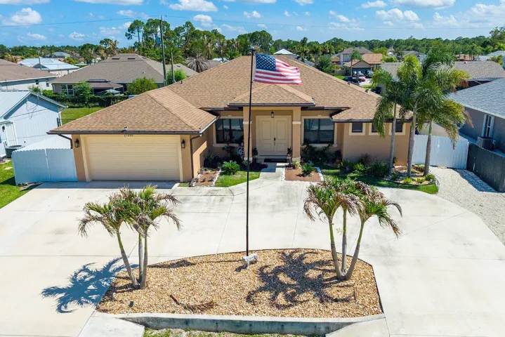 Distinctive curb appeal begins with a circular driveway, impressive entry, and timeless design.