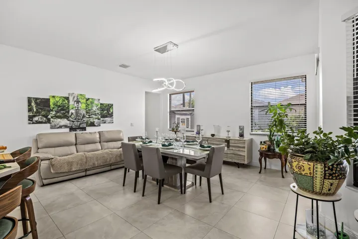Featuring a spacious walk-in tiled shower, quartz vanity, and modern finishes, this full bath offers both comfort and convenience for guests or multigenerational living.