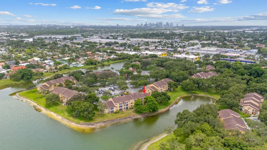 Bird’s-eye perspective showcases the property’s position near expansive water views with convenient access to the surrounding area.