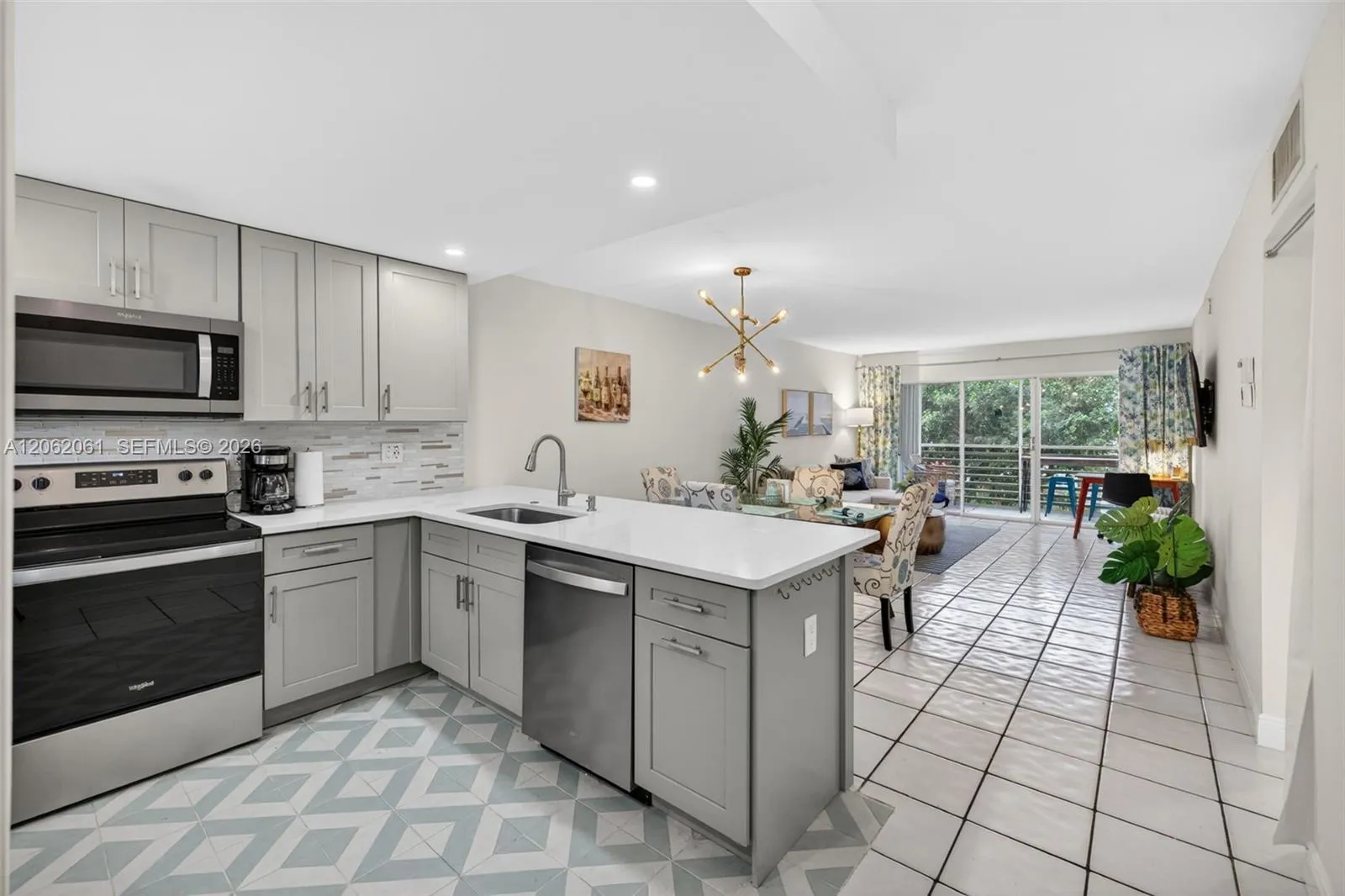 Fully equipped kitchen with stainless steel appliances, coffee maker, cookware, and all essentials—perfect for preparing anything from a quick breakfast to a full home-cooked meal.