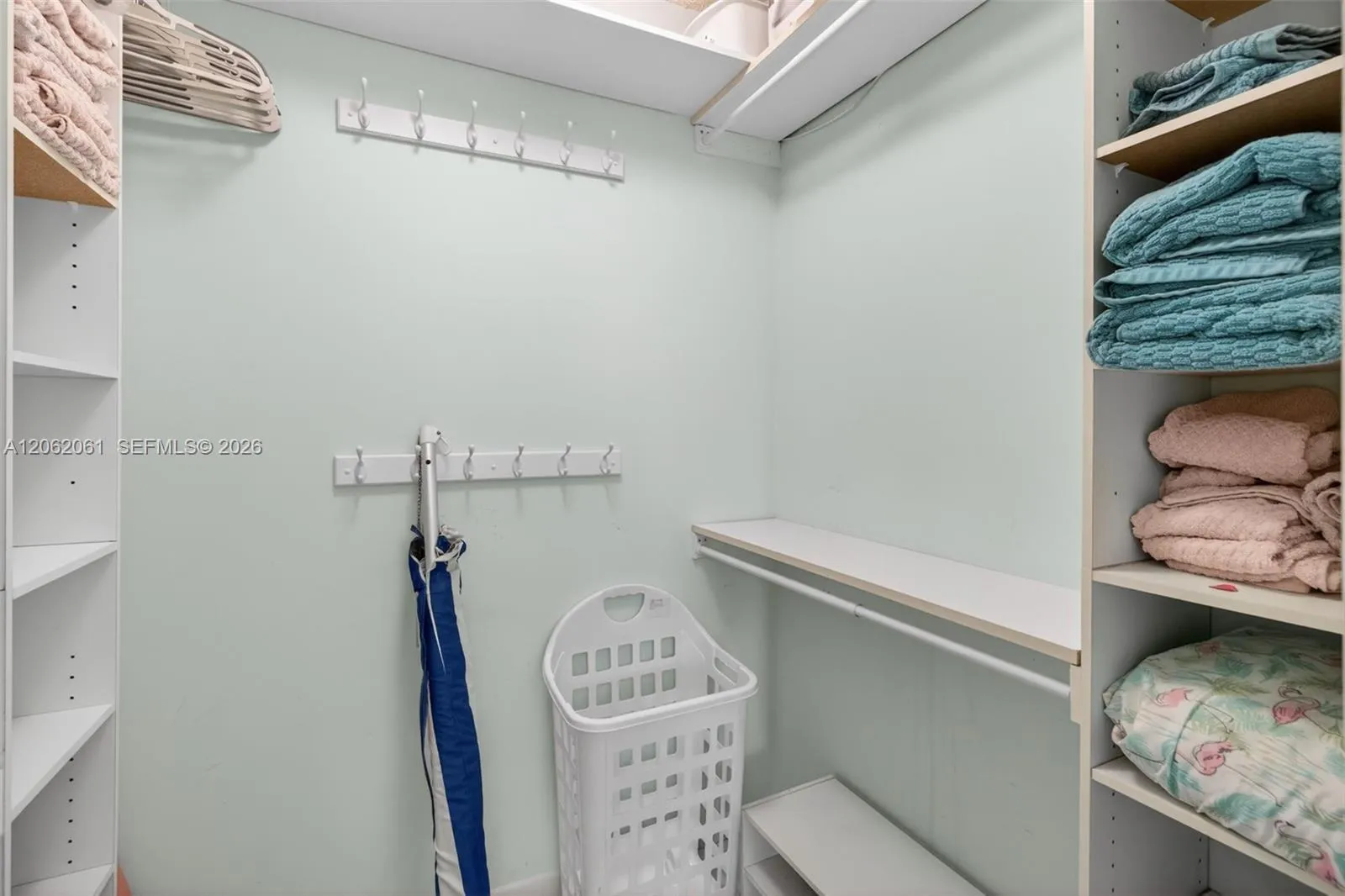 Generous walk-in closet in the primary bedroom offering extra storage along with towels, blankets, and convenient extras for a comfortable stay.