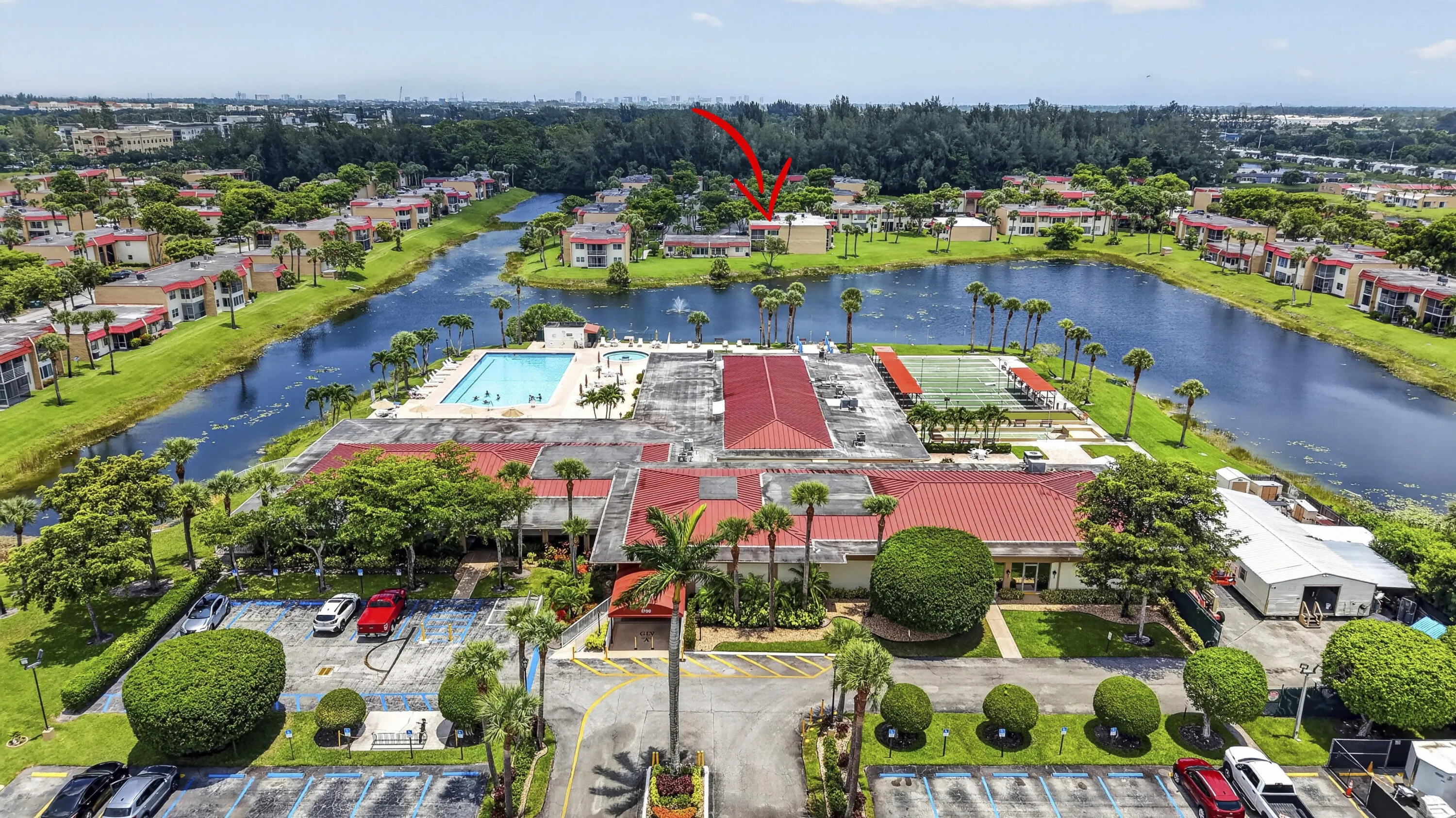 Aerial perspective showcasing a residential community with a central amenity area