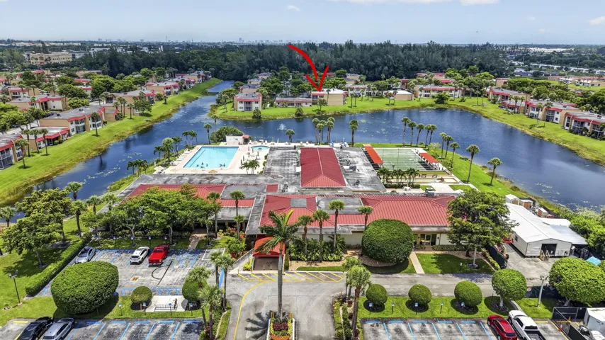 Aerial perspective showcasing a residential community with a central amenity area