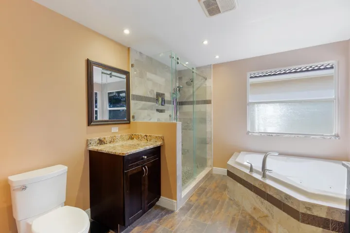 Master Bathroom with shower and heated jetted tub