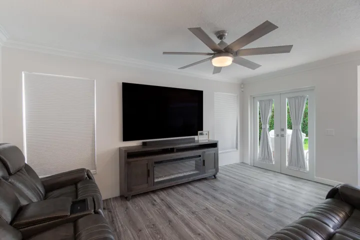 Den / Family Room with pool exit
