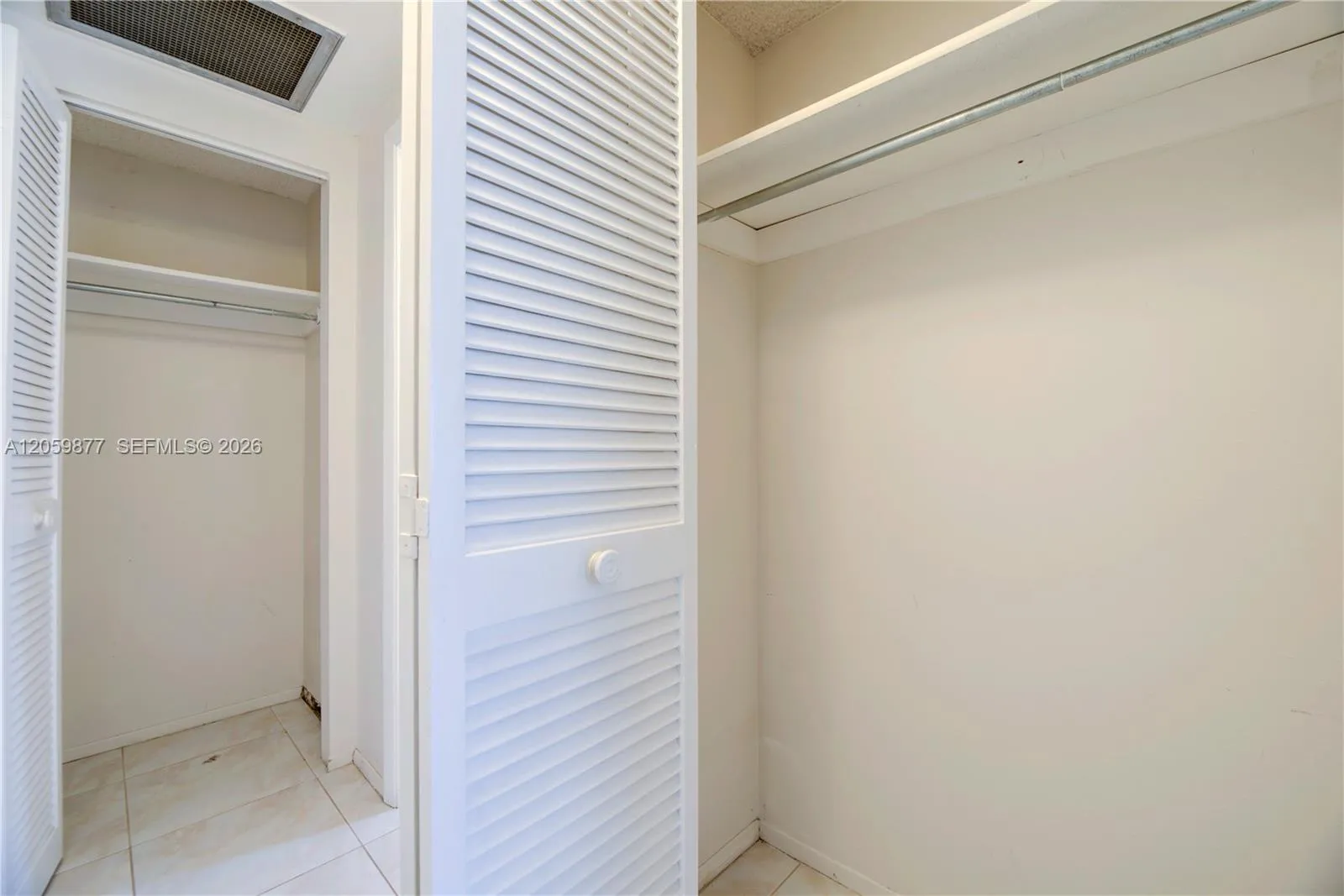 2 closets in foyer area of the bedroom