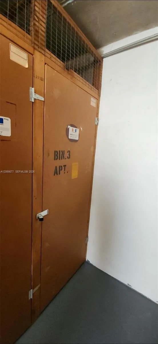 a storage bin in the storage room on the floor.
