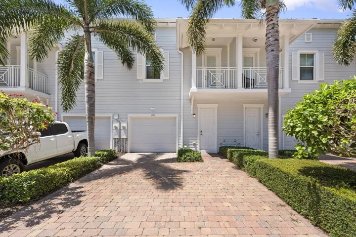Back entrance with garage