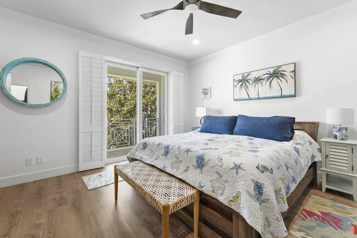 Primary bedroom with balcony
