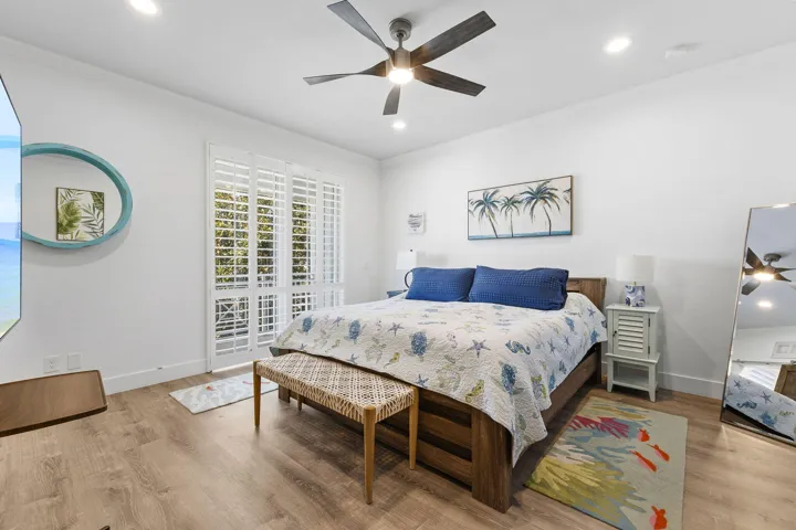 Primary bedroom with balcony
