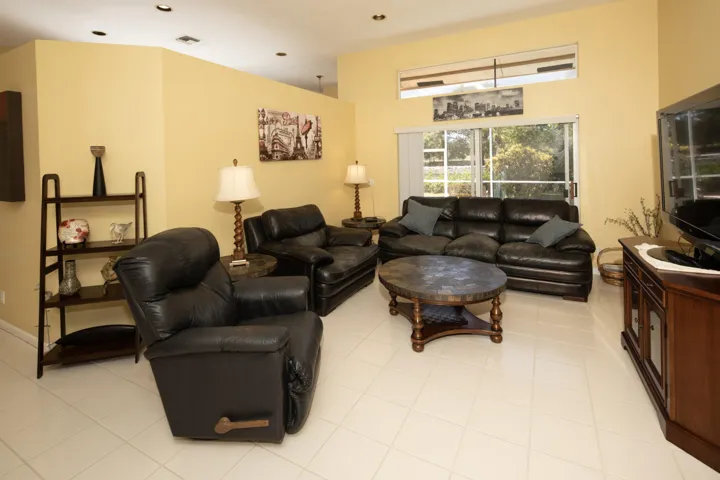 Spacious living room with an open floor plan, abundant natural light, and comfortable everyday living space.