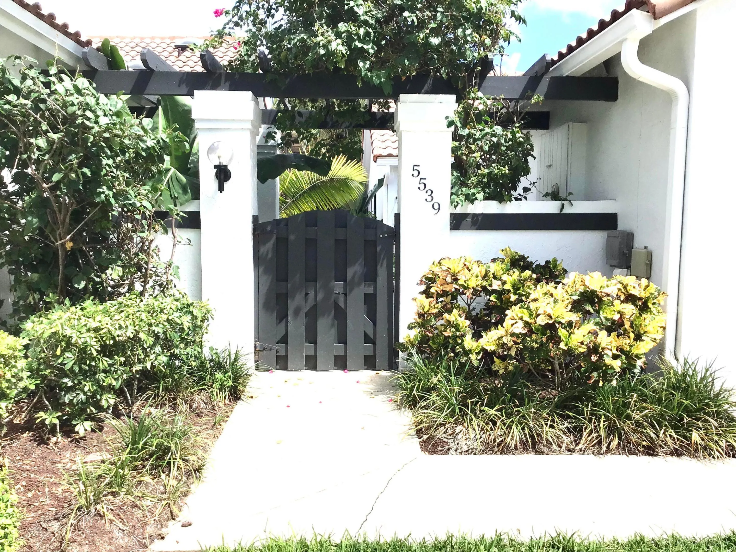 PRIVATE GATED ENTRY TO COURTYARD