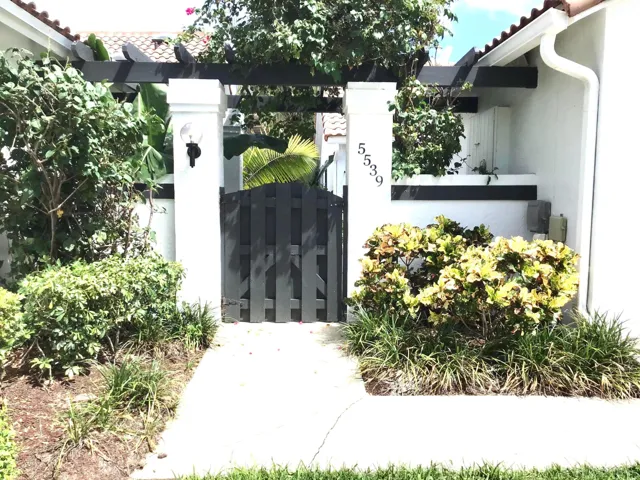 PRIVATE GATED ENTRY TO COURTYARD