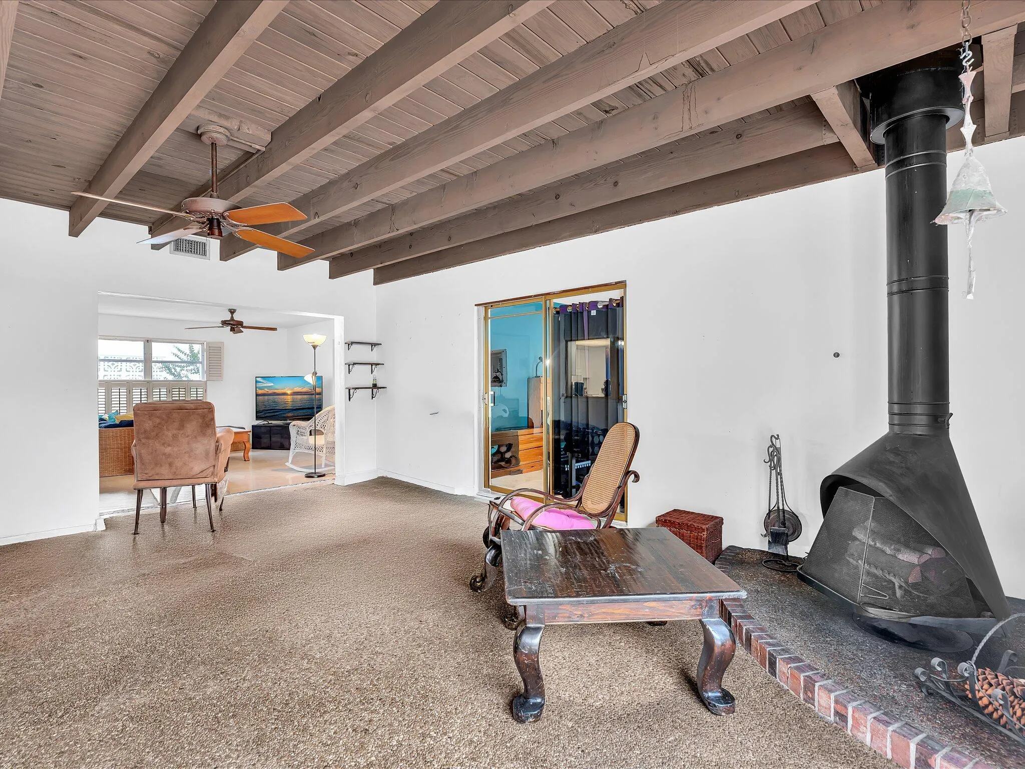 Featuring free standing wood burning fireplace