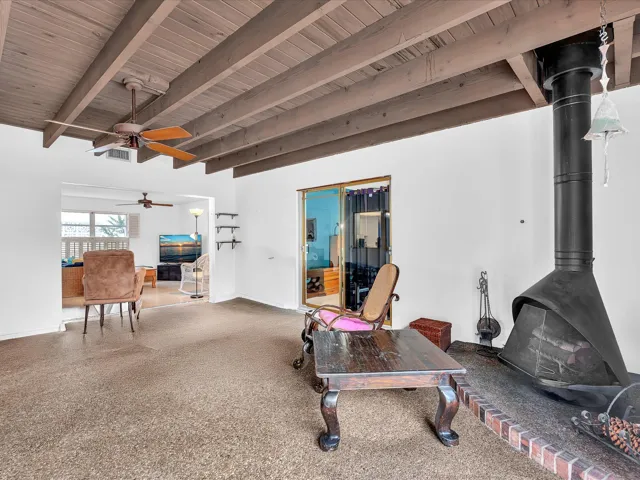 Featuring free standing wood burning fireplace