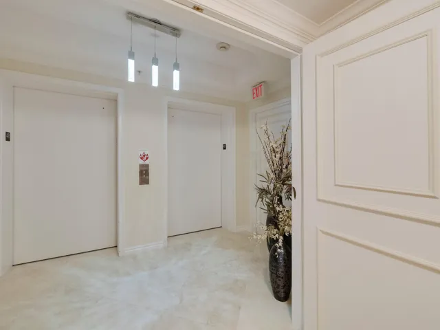 Private elevator leaves you in front of your double door entry to your home.