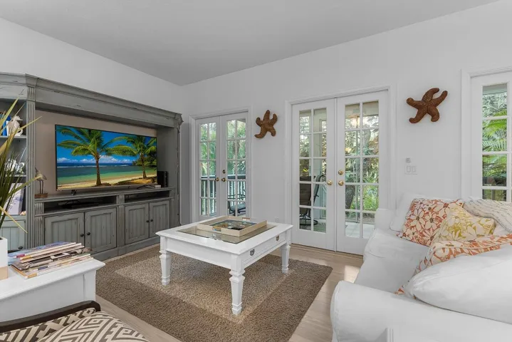 LIVING AREA OPENS OUT TO PRIVATE PORCH