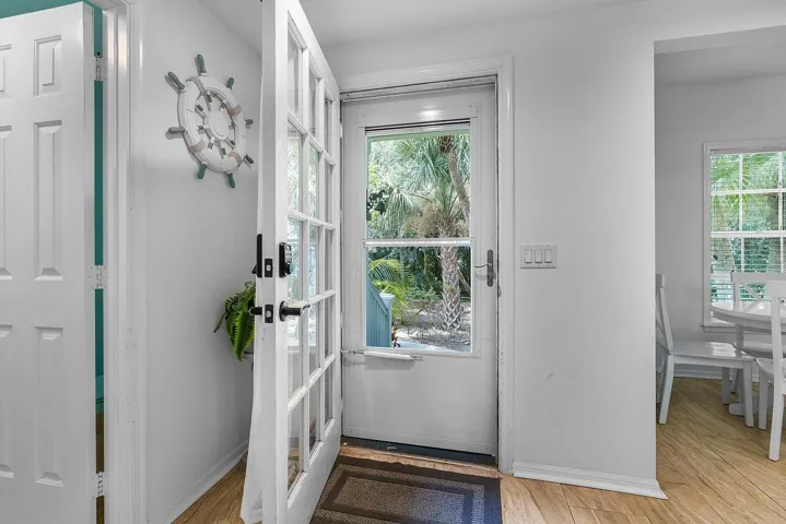 ENTER INTO AN OPEN FLOOR PLAN SPACE