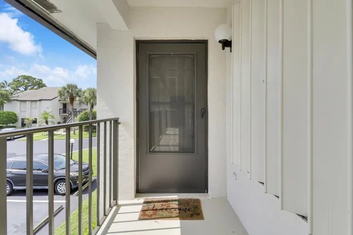 Front entry storm door